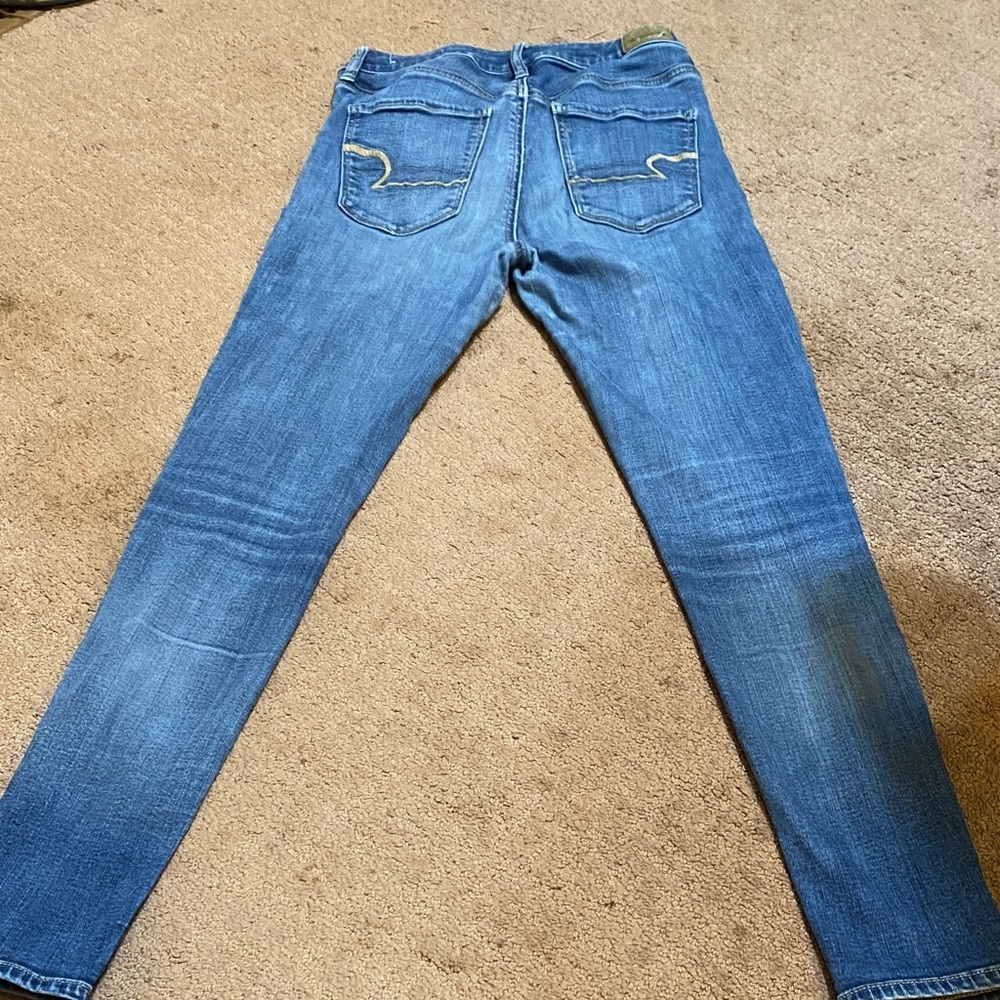 Stylish AEO Super Stretch Size 4 Thrashed Blue Jeans